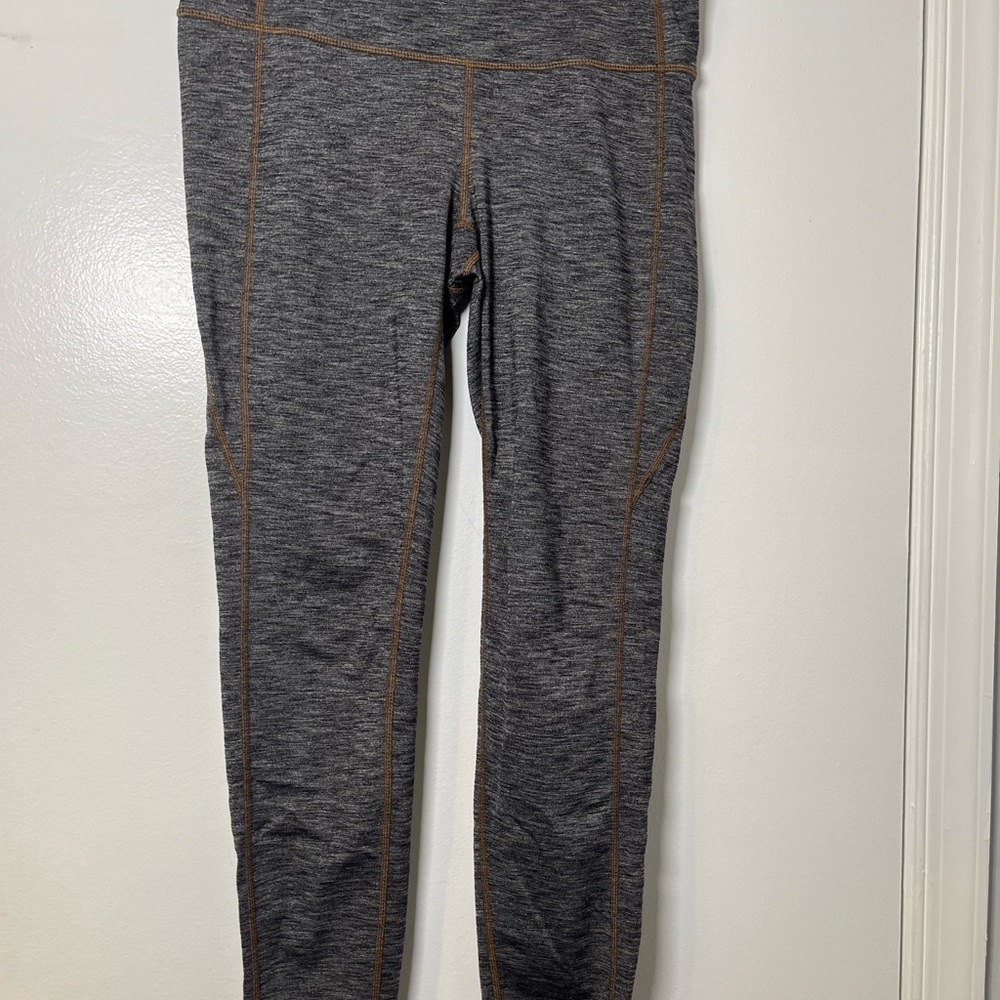 Athleta black& brown stitched yoga pant, size M